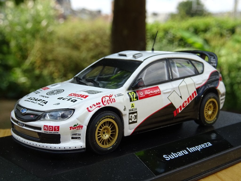 2009 Subaru Impreza Rally Portugal - 1/43, Enlèvement ou Envoi, Comme neuf, Voiture
