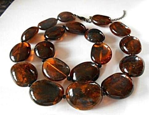 Avon: de set „Chocolate” (ketting + armband), Ophalen of Verzenden, Nieuw, Bruin