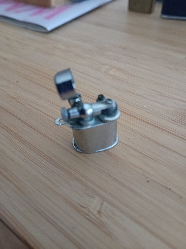 Miniature briquet antiquité pour porte chaine, Ophalen