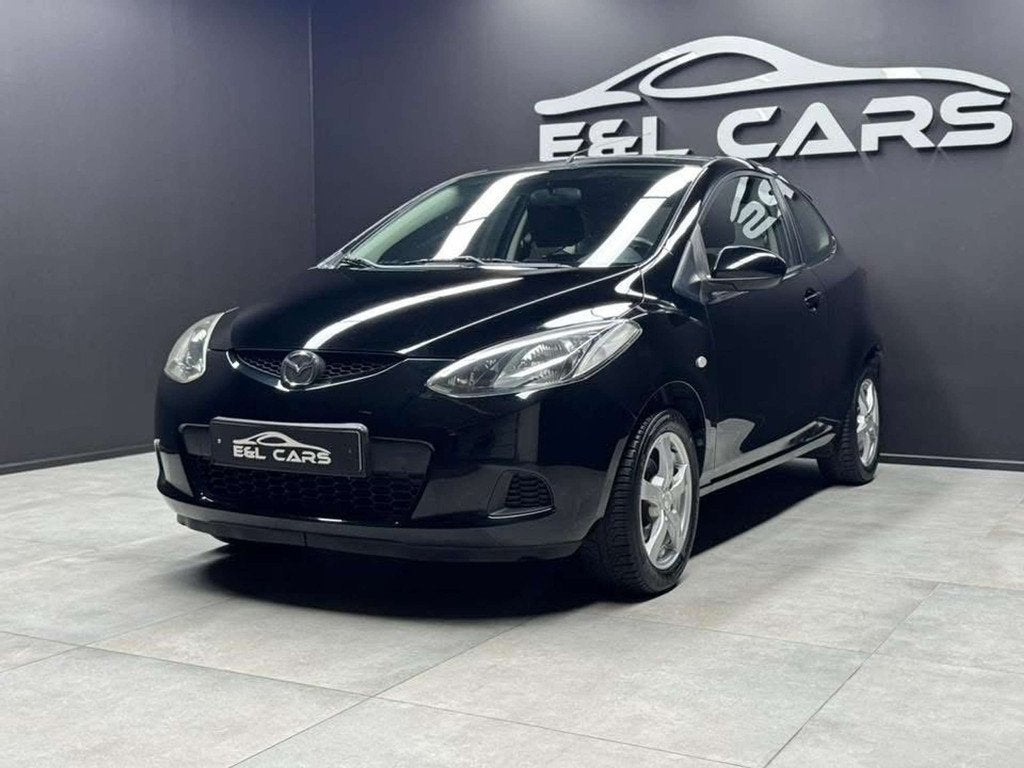 Mazda 2 Réservé (bj 2011), Stof, Zwart, 4 cilinders, Zwart