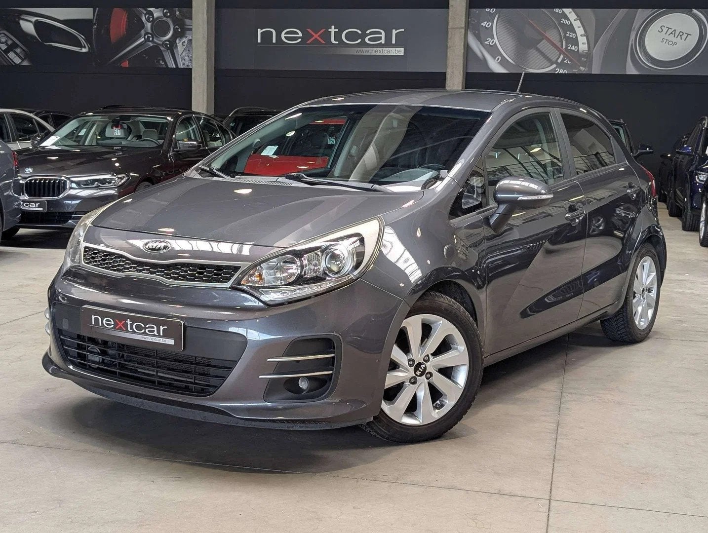 Kia Rio 1.2i Lounge *NAVI-CAMERA-PARKING-CRUISE* (bj 2016), Auto's, Stof, Gebruikt, 4 cilinders, 109 g/km