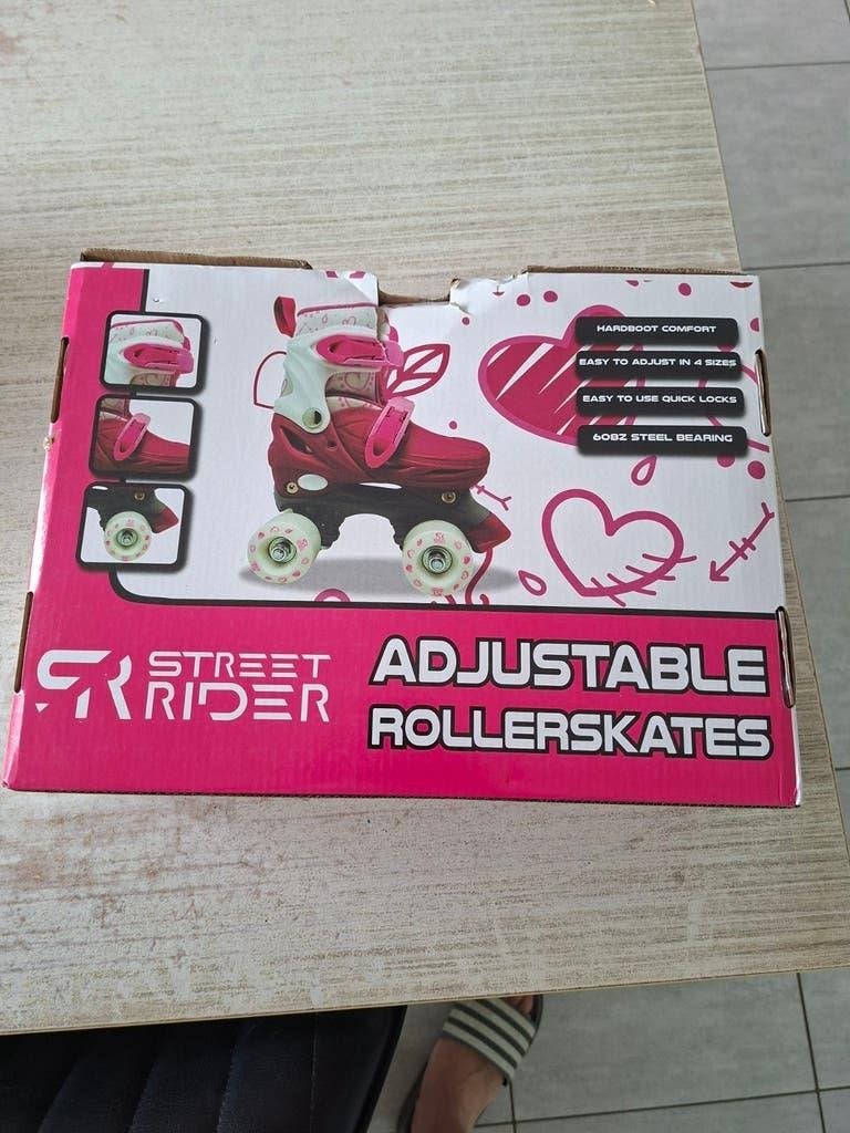 street rider adjustable rollerskates 31-34 met bescherming, Ophalen, Verstelbaar, Zo goed als nieuw, Kinderen