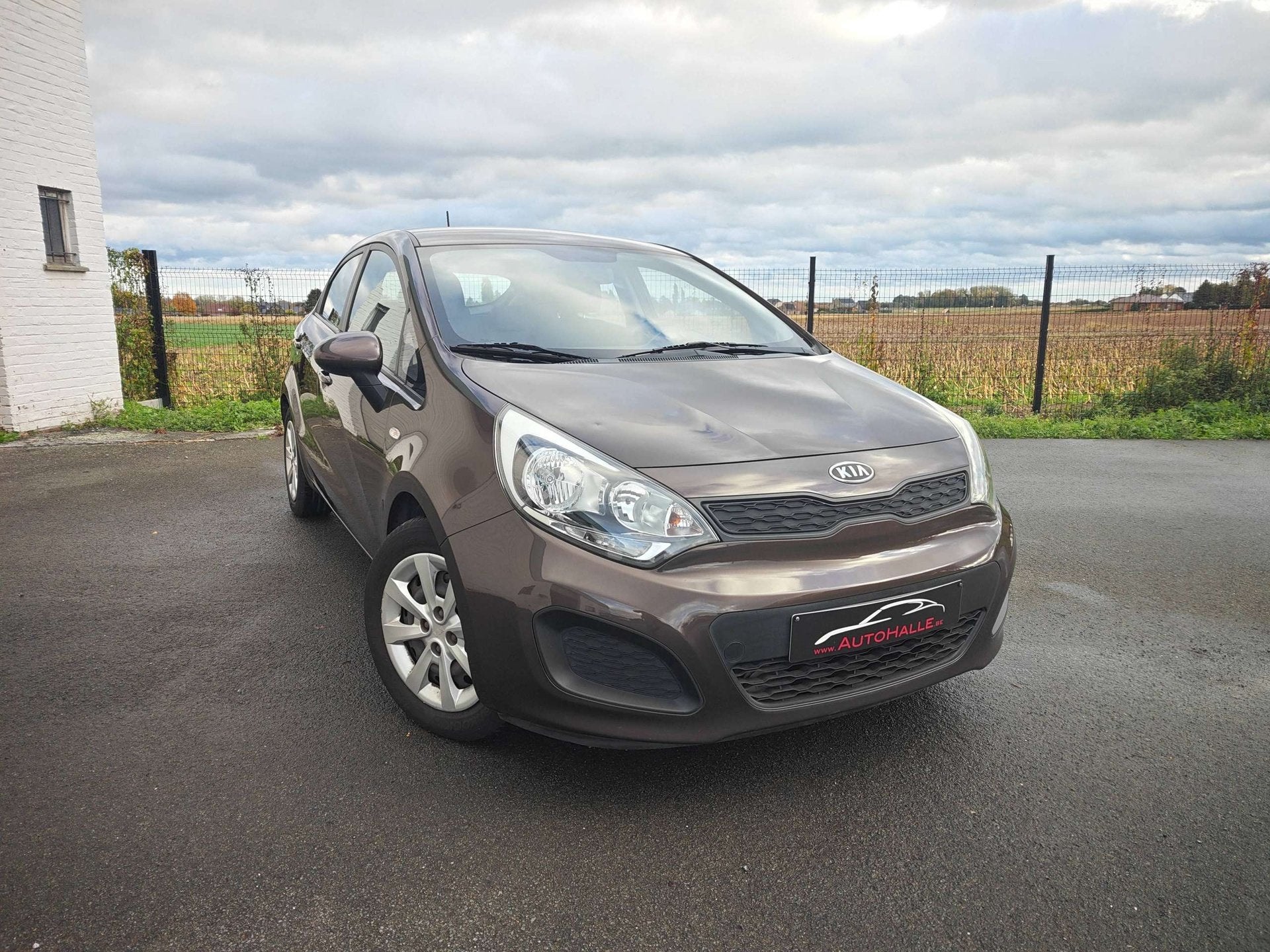 Kia Rio Rio 1.2i Lounge BENZINE - AIRCO - 12M GARANTIE, Autos, Euro 5, Achat, 63 kW, Entreprise
