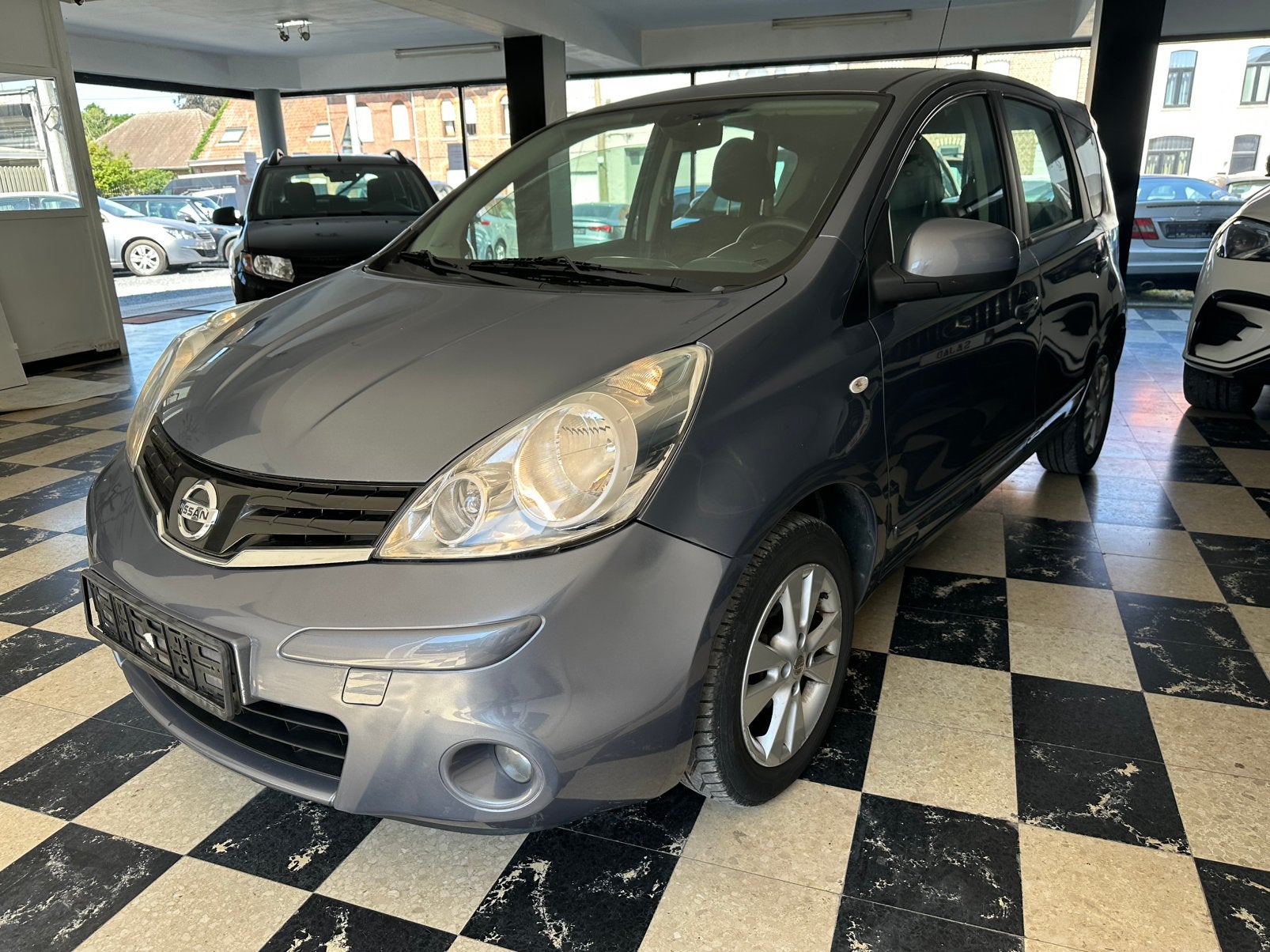 Nissan Note 1.4i | Navigatie | Airco | Parkeersensoren, Auto's, Nissan, Voorwielaandrijving, Stof, 139 g/km, Zwart