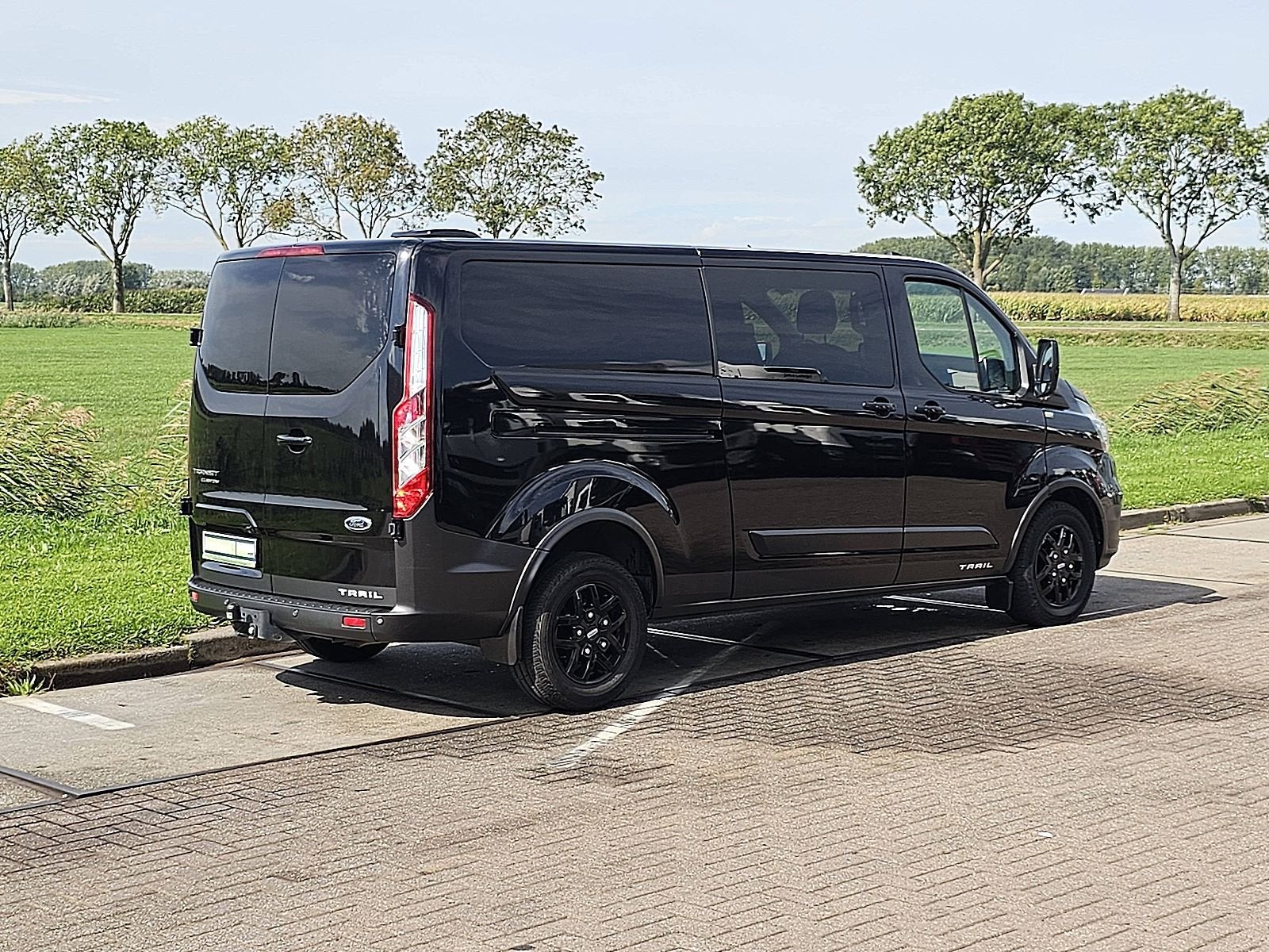 Ford Transit Custom 300 2.0 TDCI L1H2 Limited WF0ZXXTTGZMU02, Auto's, Voorwielaandrijving, Adaptive Cruise Control, Zwart, 4 cilinders