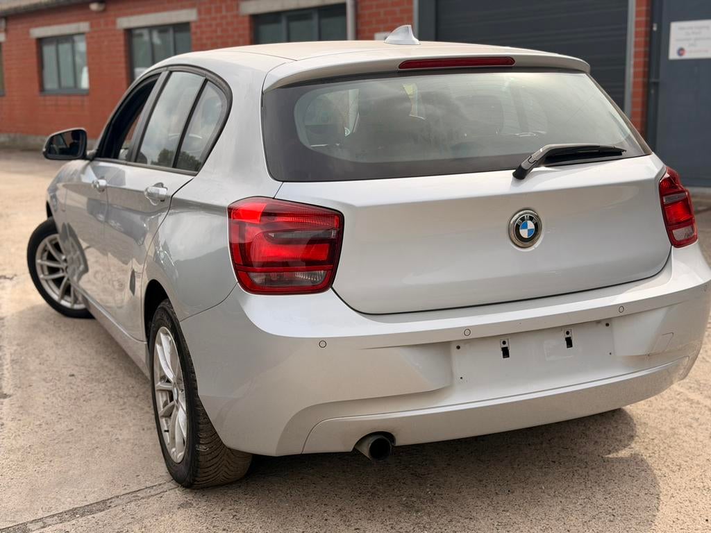BMW 1 SERIE 116iA ✅AUTOMAAT GARANTIE CARPLAY, Auto's, 110 g/km, 5 deurs, Velours, 100 kW