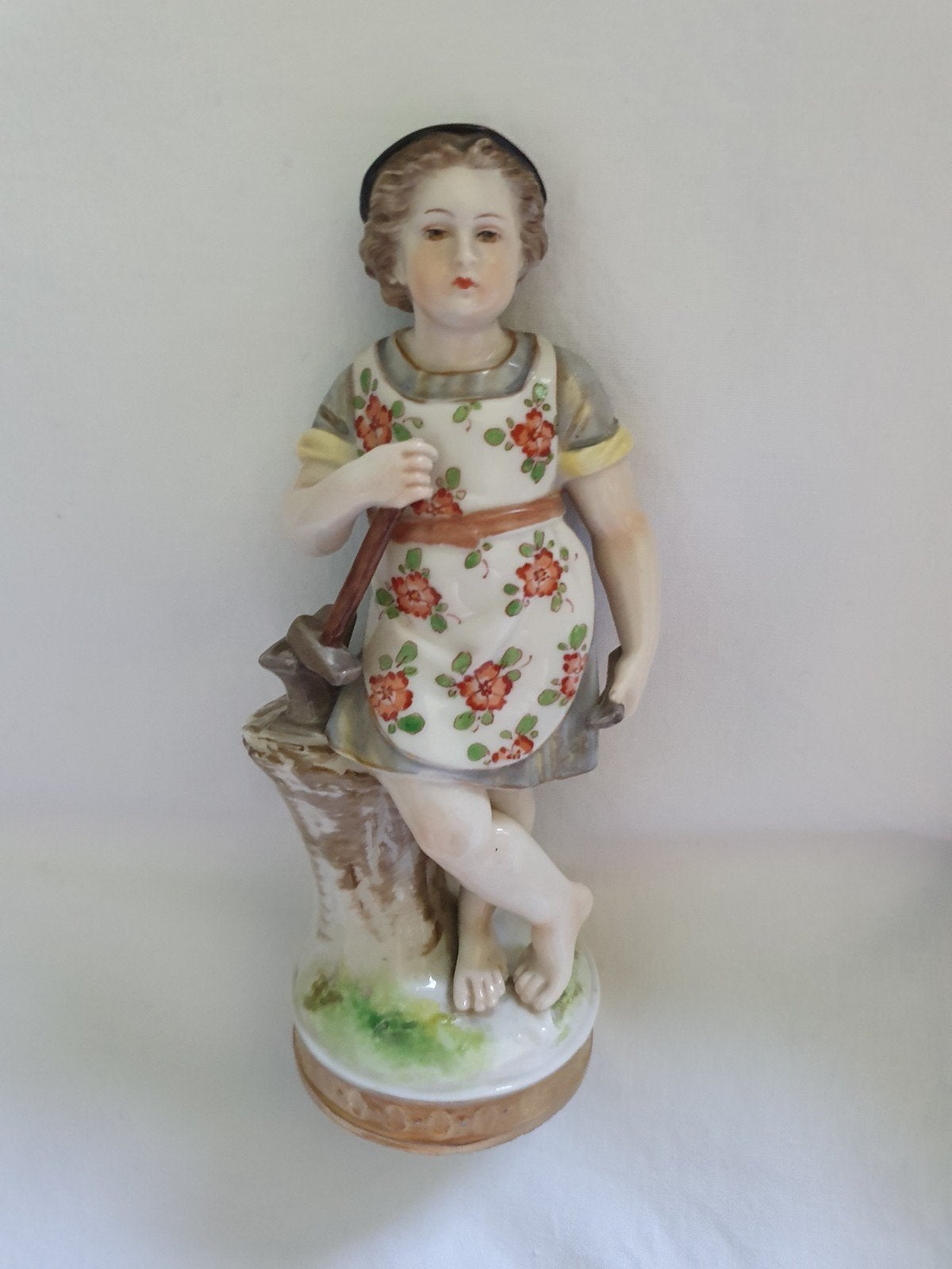 Ancien sujet en porcelaine représentant un forgeron, Enlèvement ou Envoi