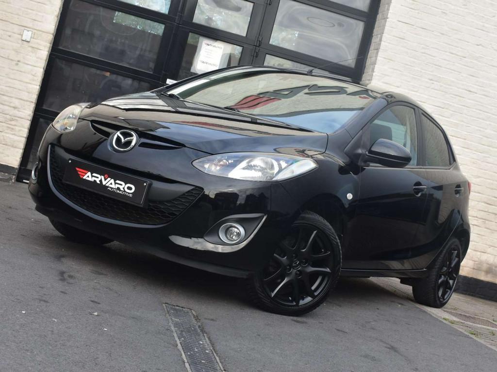 Mazda 2 1.3i Sport Verw Zetels / PDC / Airco / Garantie, Auto's, Voorwielaandrijving, Stof, Gebruikt, Zwart