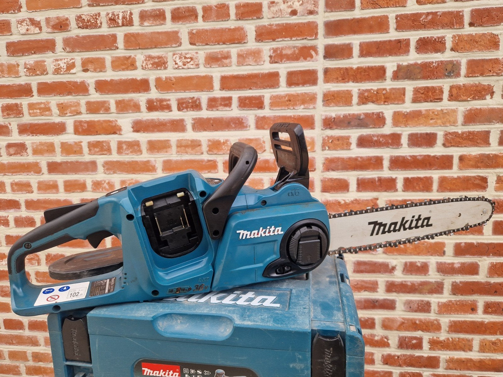makita kettingzaag duc353, Ophalen