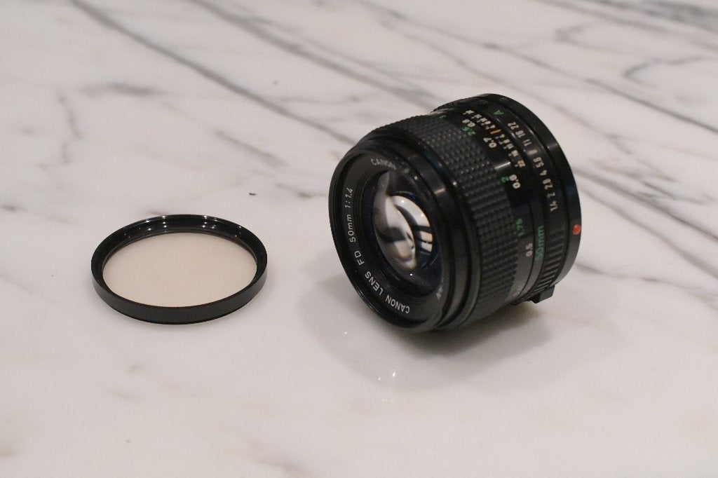 Canon FD 50mm/ 1:1.4 met Skylightfilter 1A, Ophalen of Verzenden, 1980 tot heden, Lens of Lenzen