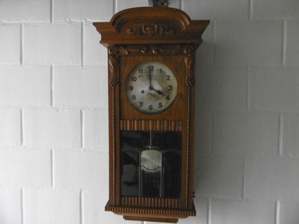 wandklok, Ophalen
