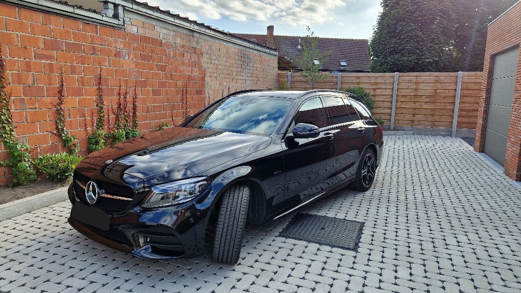 Mercedes Benz C300e AMG line, Auto's, Mercedes-Benz, Automaat, 4 cilinders, Leder en Stof, Zwart