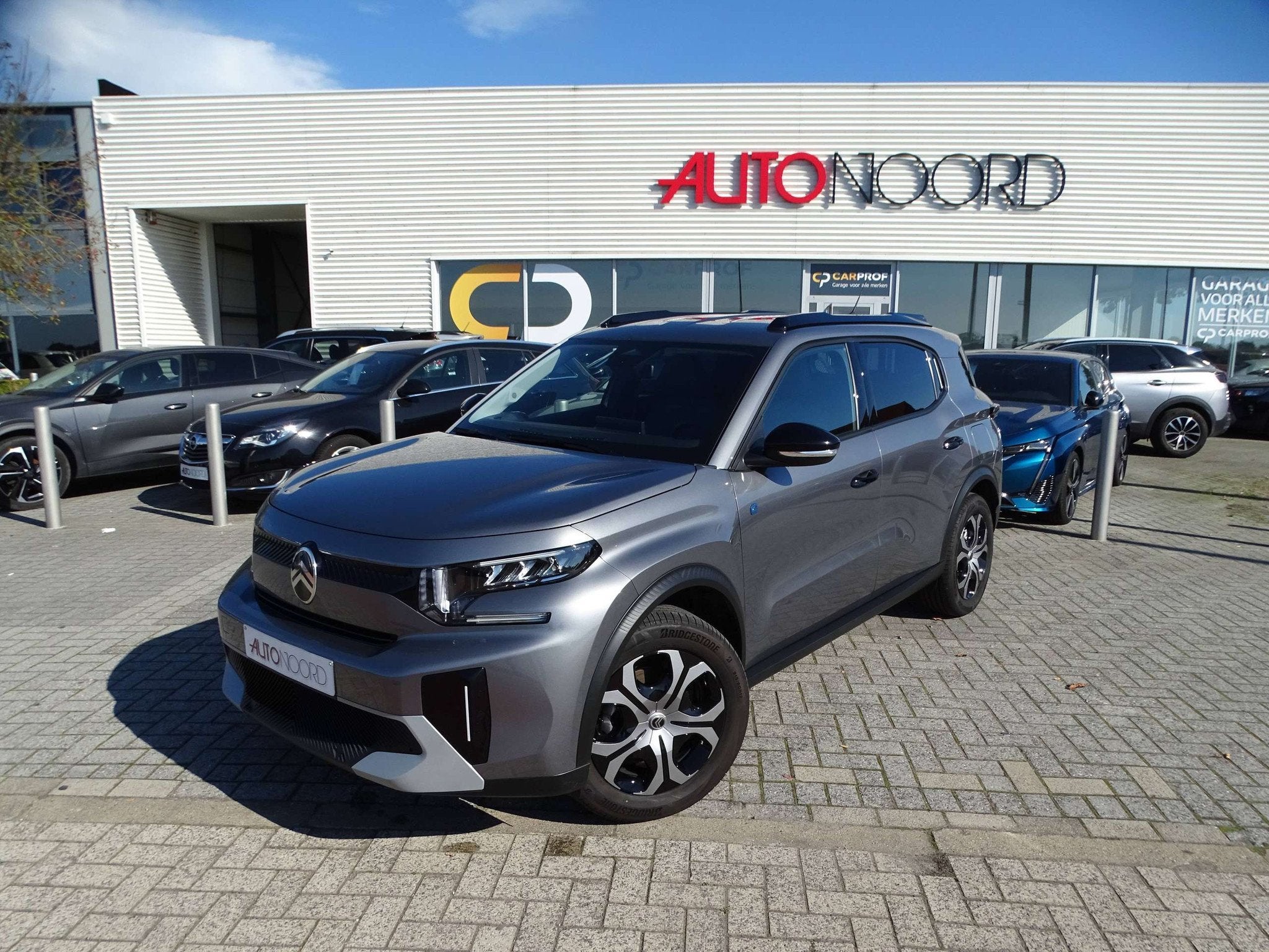 Citroën C3 Aircross e-C3 Aircross 44.2 kWh Comfort Range Ma, Auto's, Stof, Zwart, https://public.car-pass.be/vhr/bc27b605-5db6-401a-b11a-2a06078c6afa