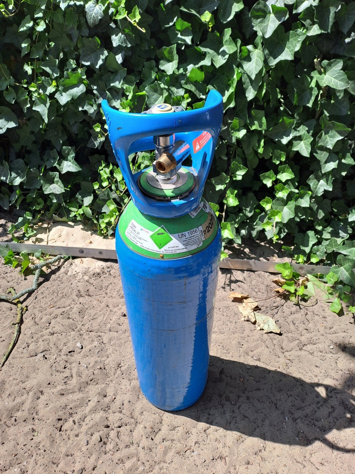 Gasfles mengas voor halfautomaat, Ophalen