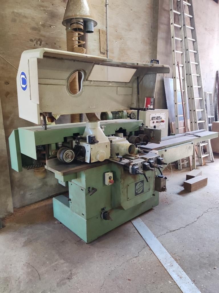 vierzijdige schaafmachine, Ophalen