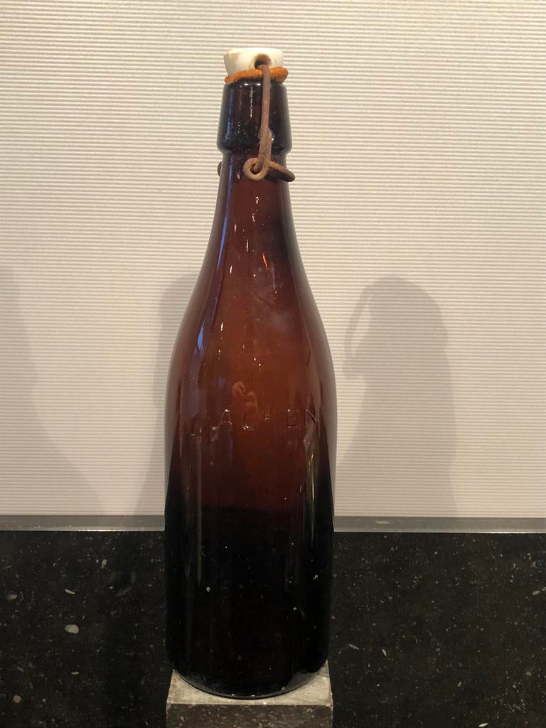 cristal alken beugelfles 75 cl bruin, Verzamelen, Biermerken, Ophalen of Verzenden, Gebruikt, Flesje(s), Overige merken