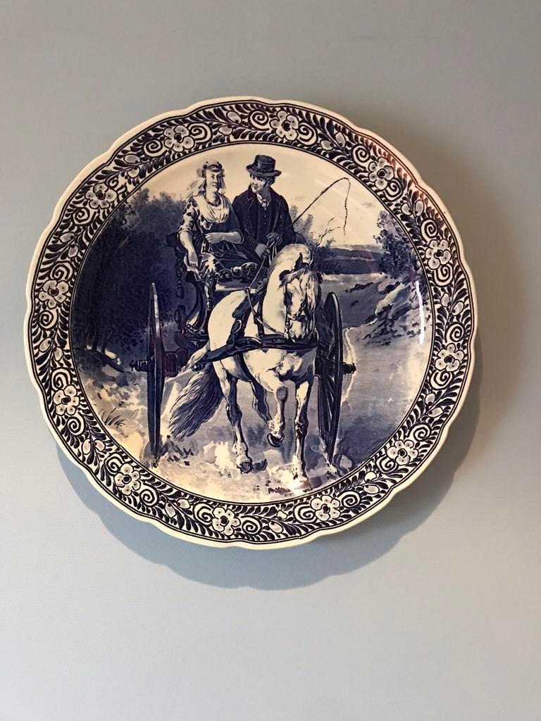 Bord met paardenkoets Delfts, Ophalen