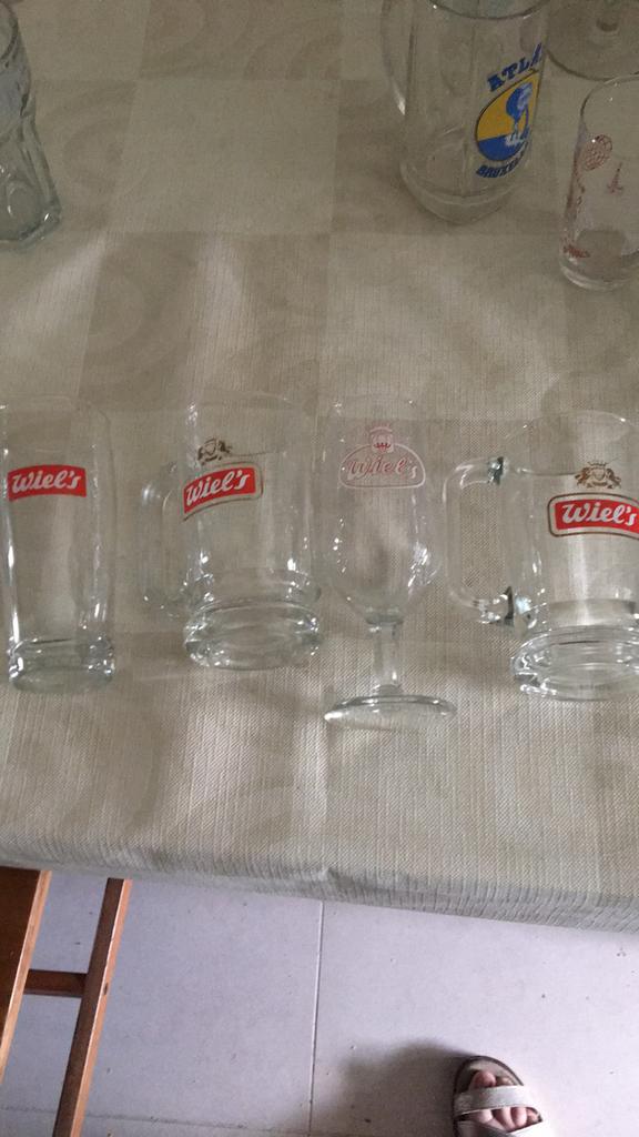 4 bierglazen Wiel’s, Ophalen of Verzenden, Zo goed als nieuw