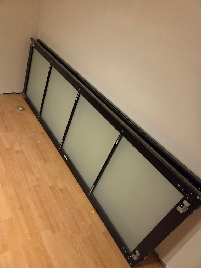 Ikea kast met schuifdeuren, Ophalen