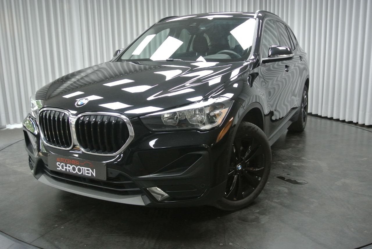 BMW X1 sDrive 18i (bj 2022, automaat), Auto's, Stof, Gebruikt, 136 pk, Zwart