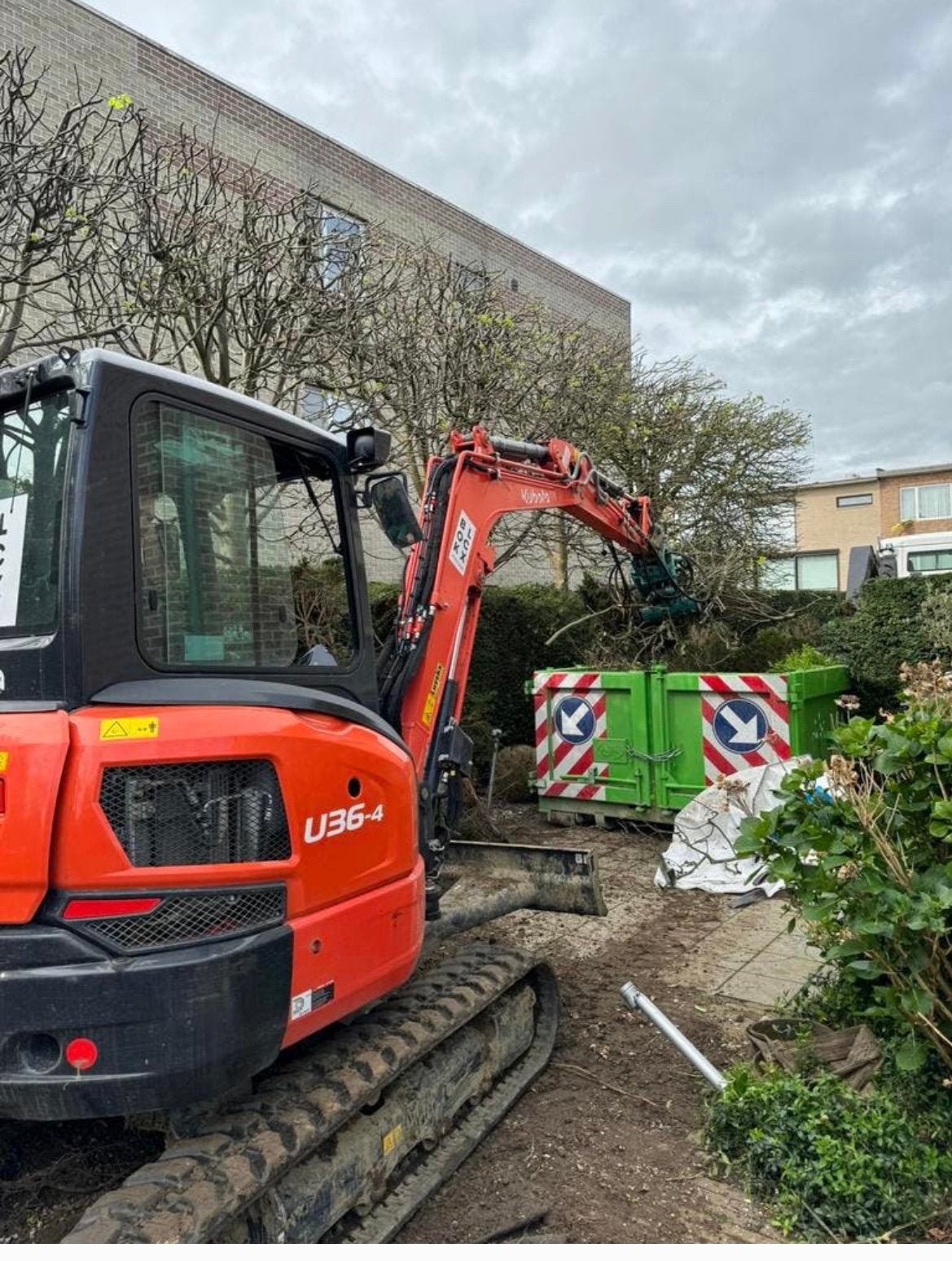Kleine grondwerken en afbraakwerken, Ophalen, Graafmachine