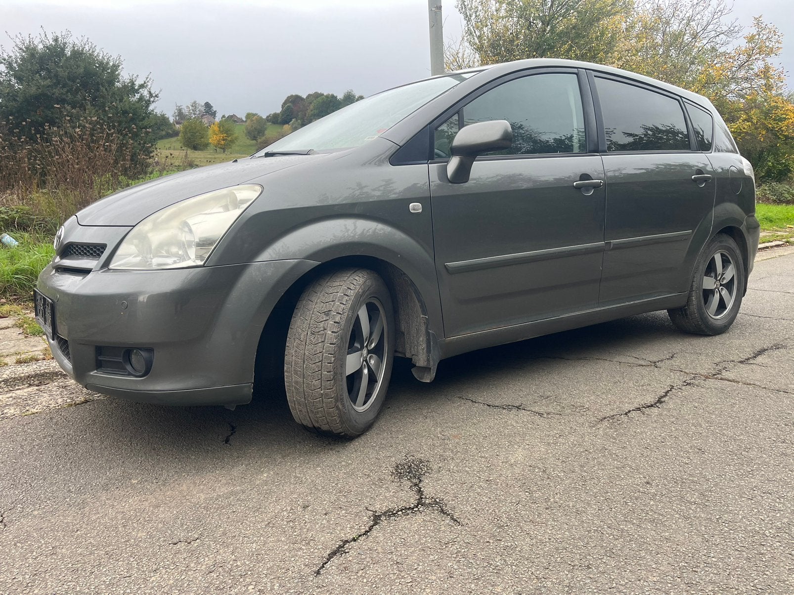 Toyota Corolla Verso 2.2 Diesel ⛽️ 7P, Auto's, Monovolume, Zwart, 7 zetels, Elektrische ramen