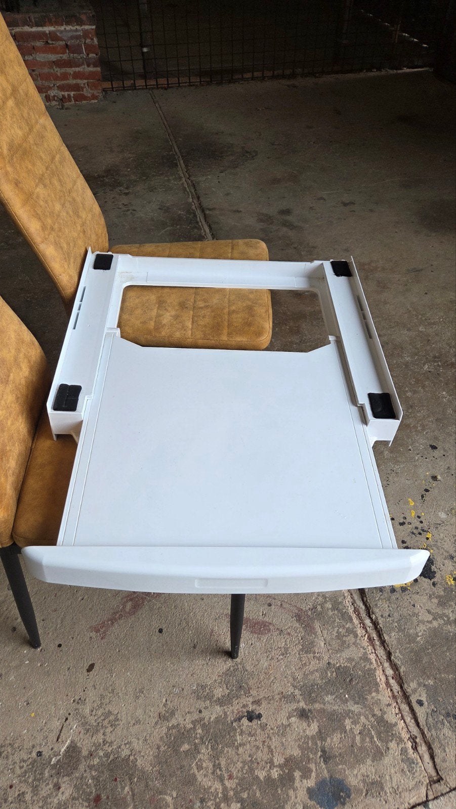 Wasmachine ophoogstuk., Ophalen