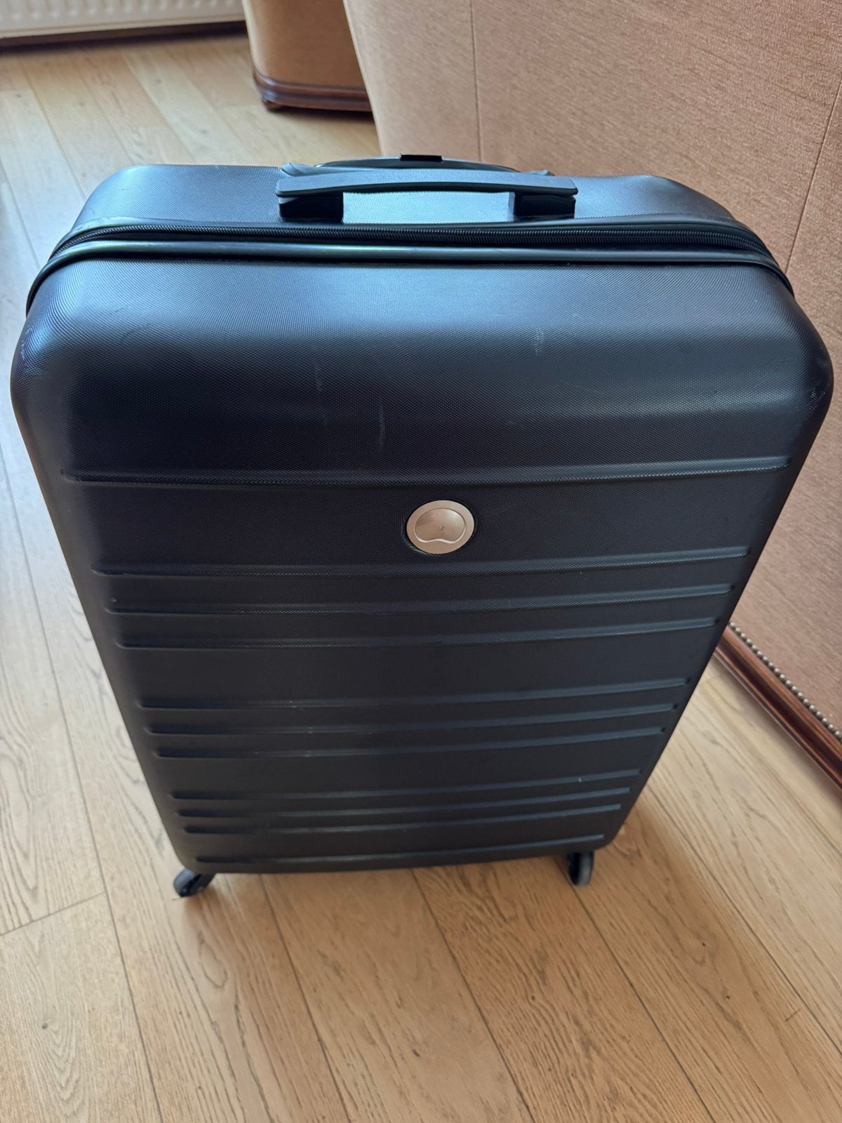 Grande valise noire Delsey, Enlèvement, Utilisé