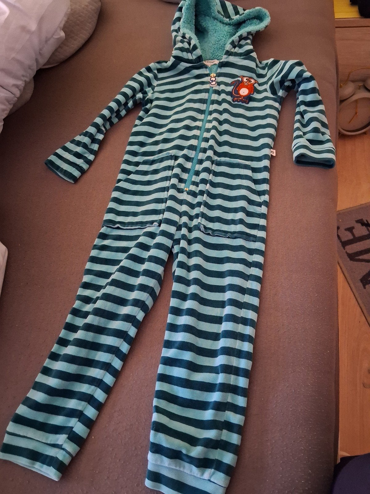 Woody pyjama nieuwstaat, Ophalen