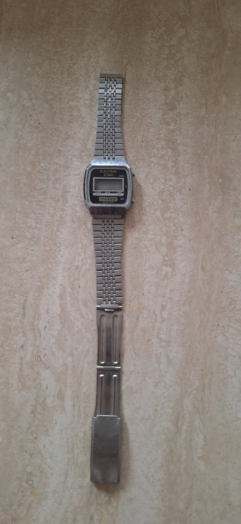 Electron Quartz LCD solar look, Bijoux, Sacs & Beauté, Montres | Hommes, Enlèvement, Utilisé, Montre-bracelet