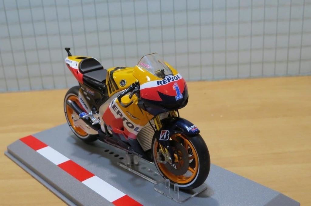 Casey Stoner Honda RC212V 2012 Repsol team 1:18 diecast, Enlèvement ou Envoi, Neuf, Moteur, Autres marques