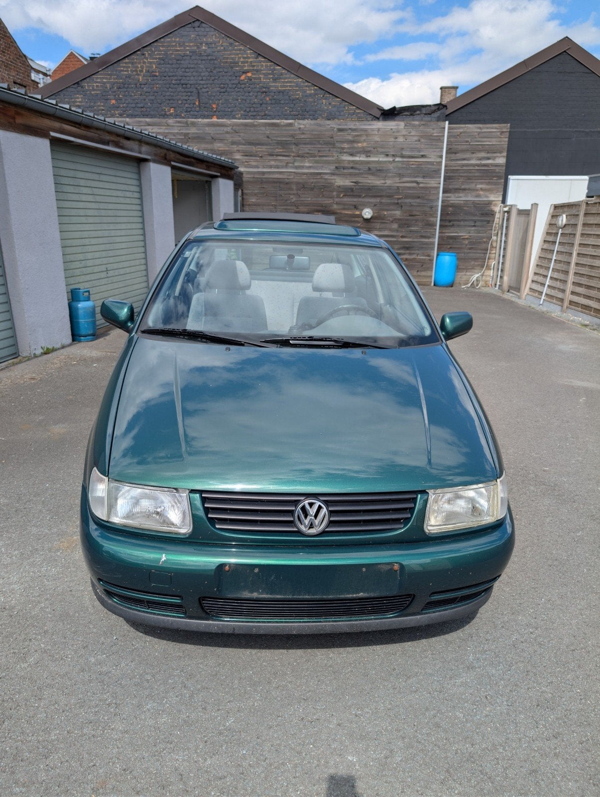 Super propere Volkswagen Polo met open dak!, Auto's, Voorwielaandrijving, Stof, Handgeschakeld, Grijs