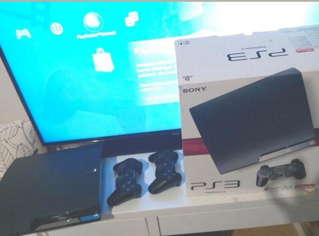Ps3 slim 120gb + 15 JEUX + 2 manettes Dual Shock 3 + boîte, Ophalen, Met games, Met 2 controllers, Zo goed als nieuw
