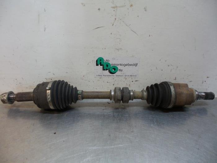 Arbre de transmission avant gauche d'un Nissan NV200, -, 3 mois de garantie, Utilisé, -