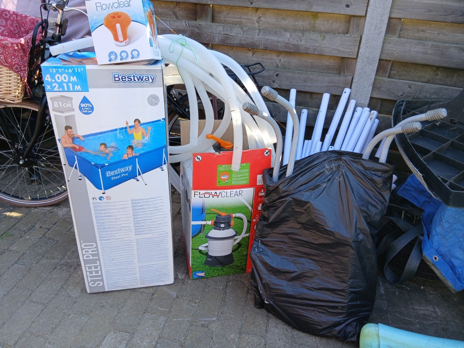 zwembad met zandfilterpomp en trap, Ophalen