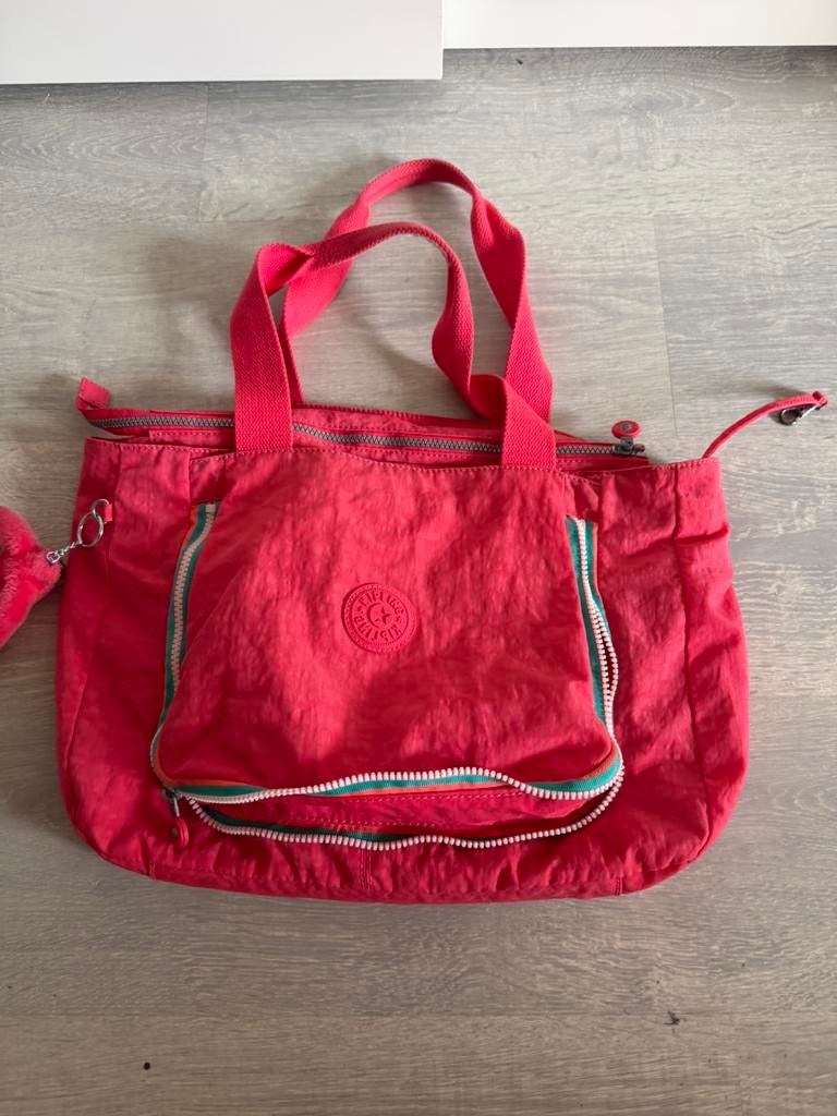 Sac Kipling, Enlèvement, Comme neuf