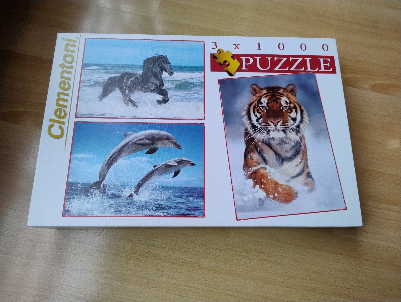 3 puzzels in doos, Enlèvement