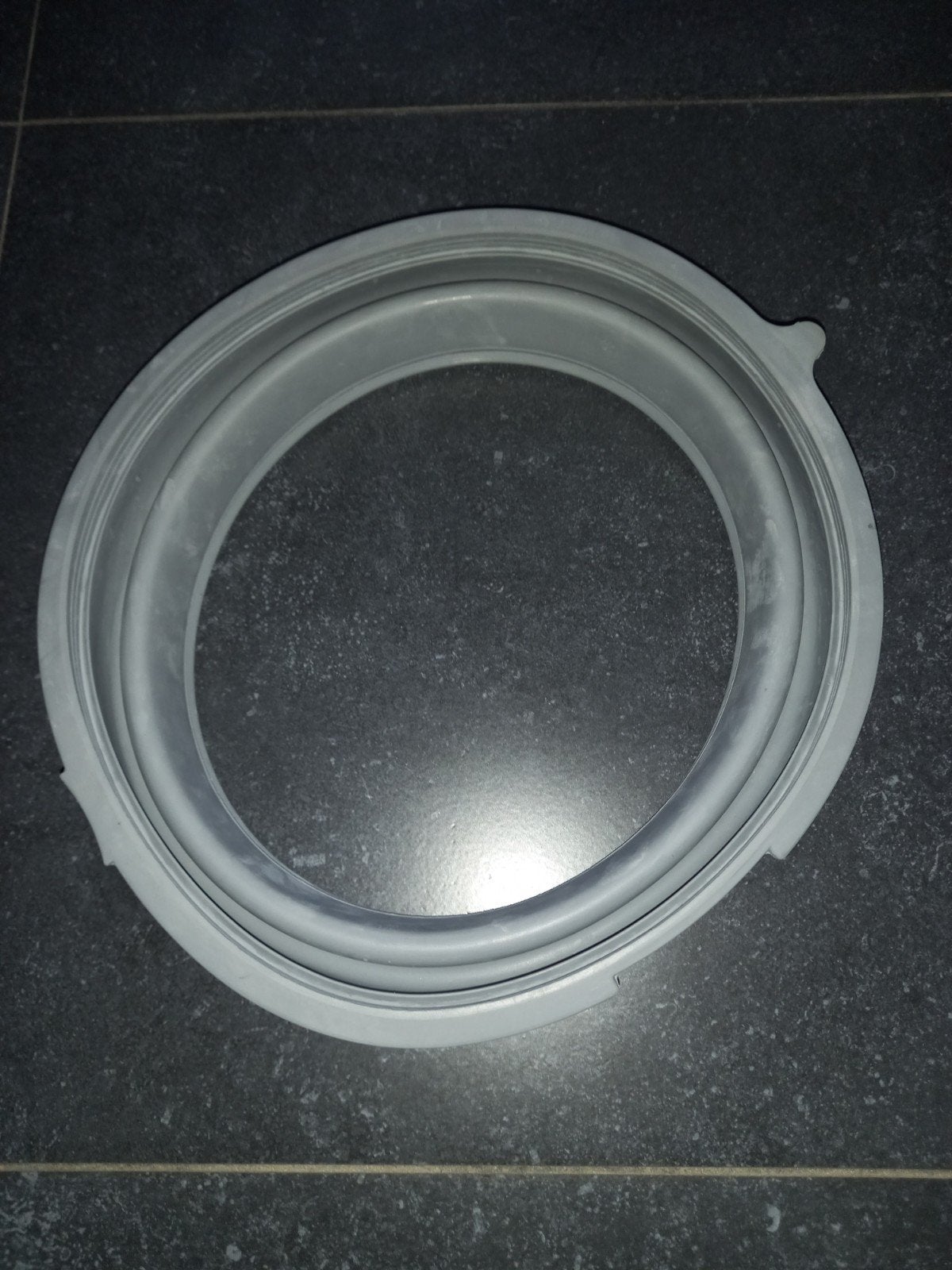 Deurrubber wasmachine, Ophalen
