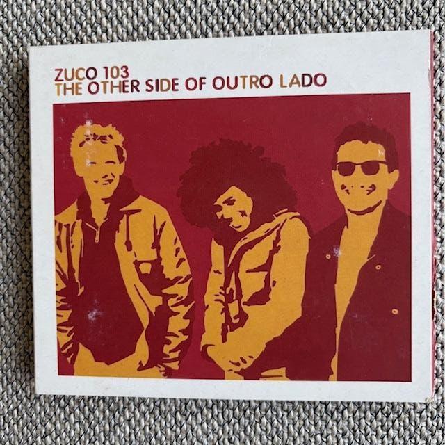 Zuco 103 - The Other Side of Outro Lado digipak, Enlèvement ou Envoi