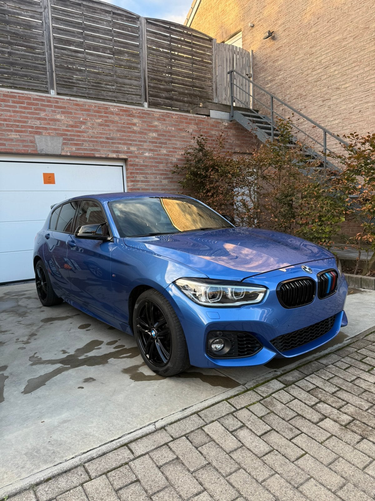 BMW 116i M Sport, Auto's, Voorwielaandrijving, Blauw, Leder, Bedrijf