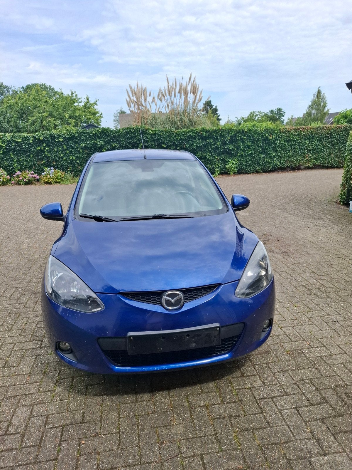 Mazda 2 met airco, Autos, Mazda, Boîte manuelle, Noir, Particulier, Tissu