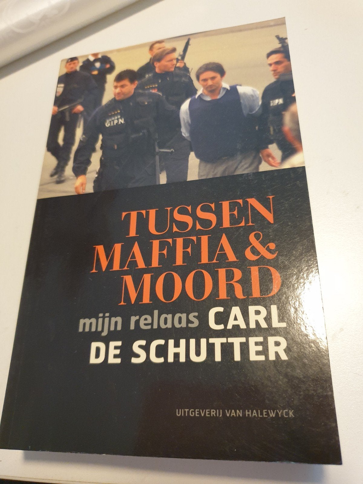 Carl de Schutter - Tussen mafia en moord, Ophalen of Verzenden, Zo goed als nieuw, C. de Schutter