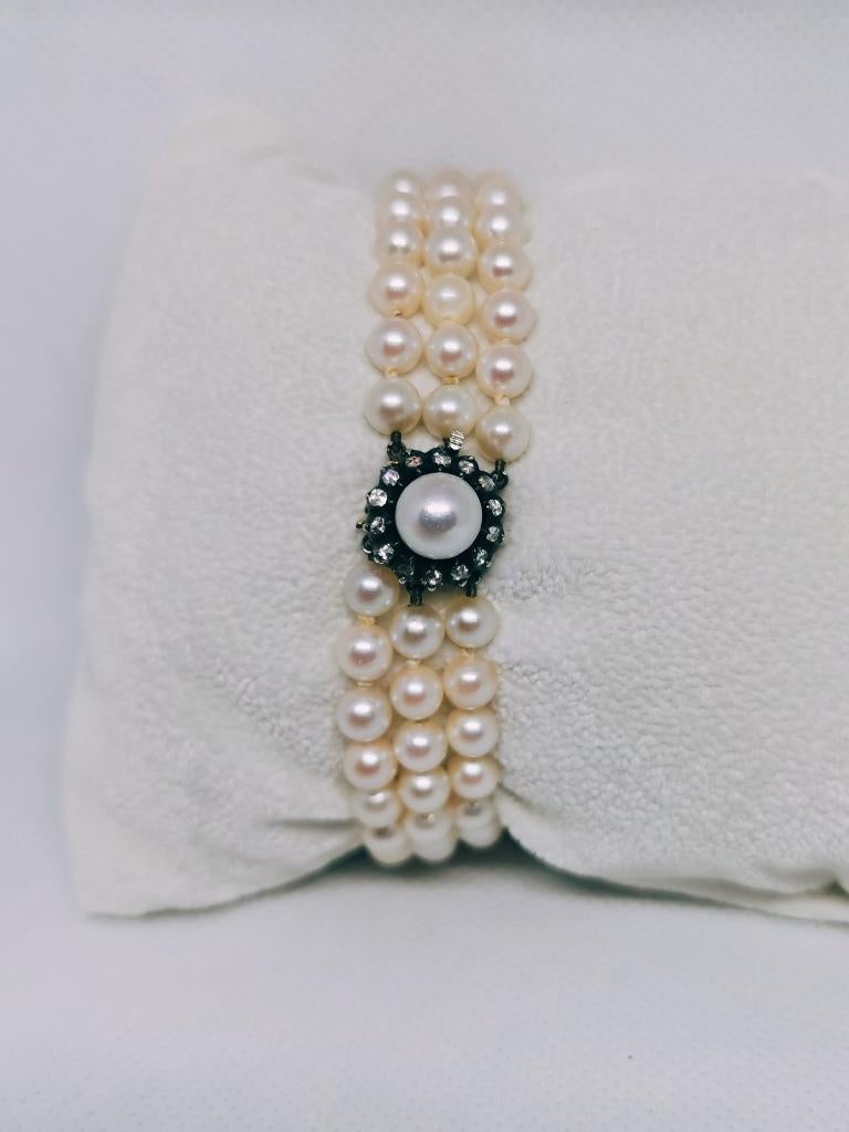 Akoyaparels armband met 19 eeuw gouden slot en diamanten, Met bedels of kralen, Ophalen of Verzenden, Zo goed als nieuw, Goud