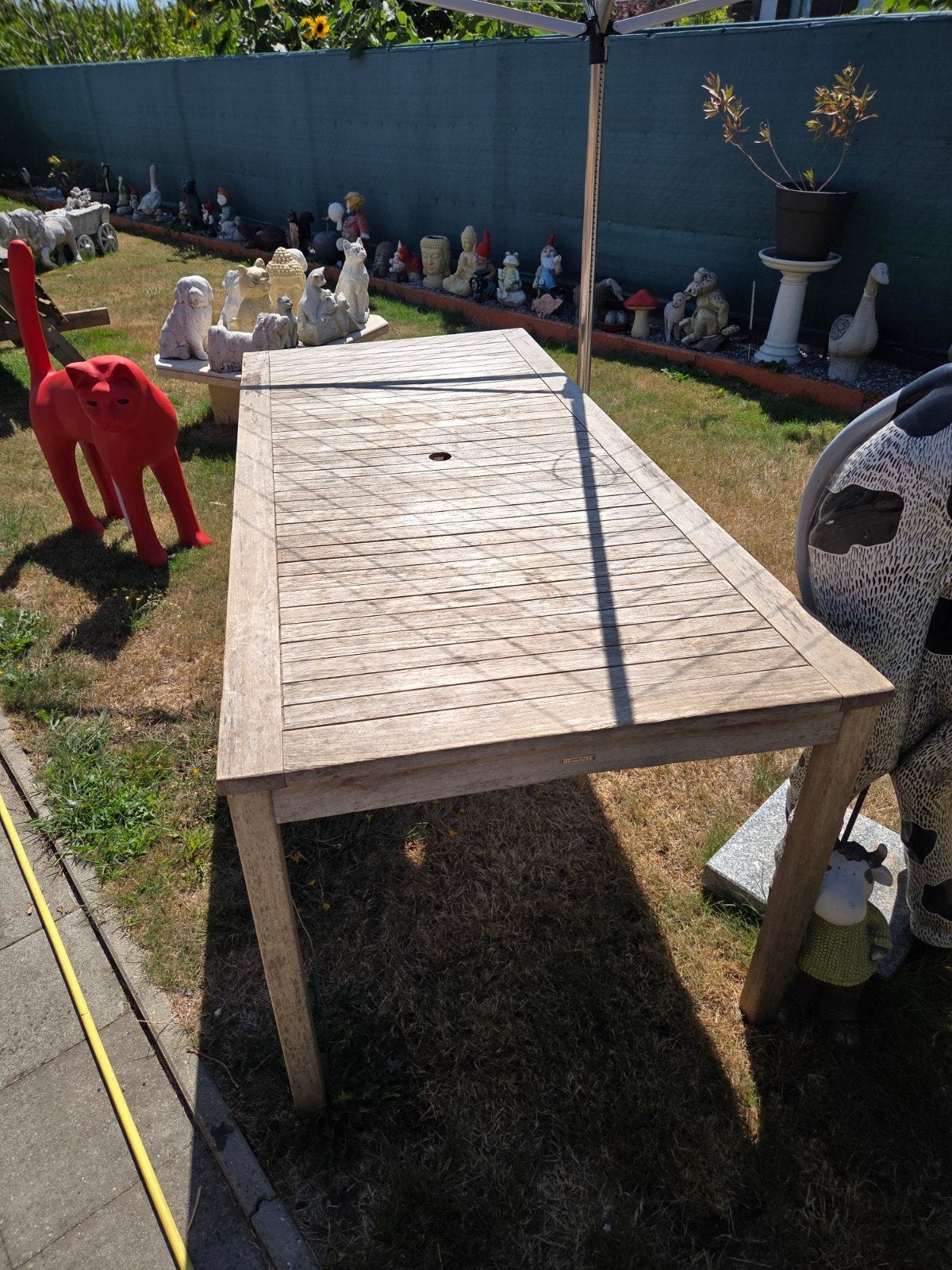 tuintafel in teak, Ophalen