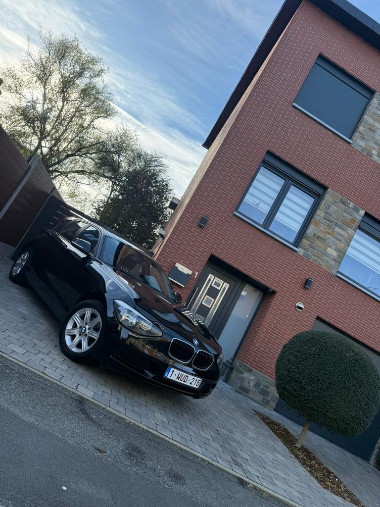 BMW serie 116i Euro6 essence 132500KM, 100 kW, 4 cilinders, 1590 cc, Zwart