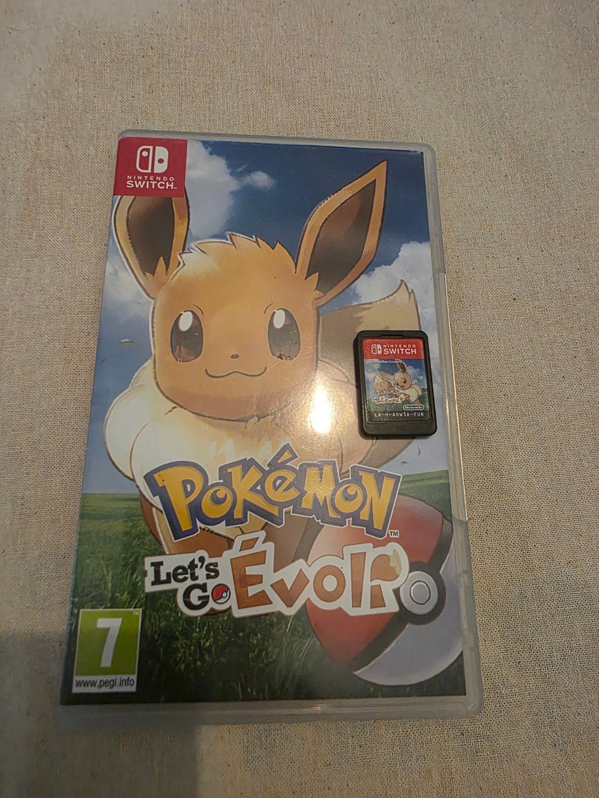 Pokémon Let's Go Évoli (Eevee) voor Nintendo Switch, Games en Spelcomputers, Games | Nintendo Switch, Zo goed als nieuw, Vanaf 7 jaar