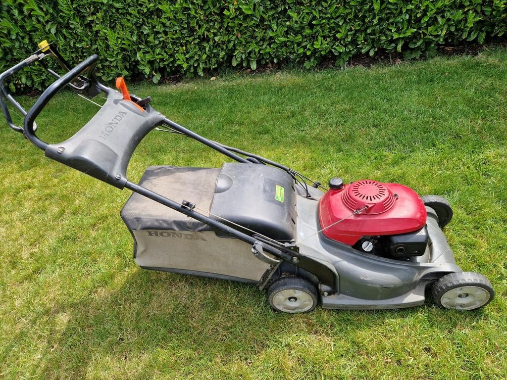 Honda grasmaaier met werk aan, Ophalen