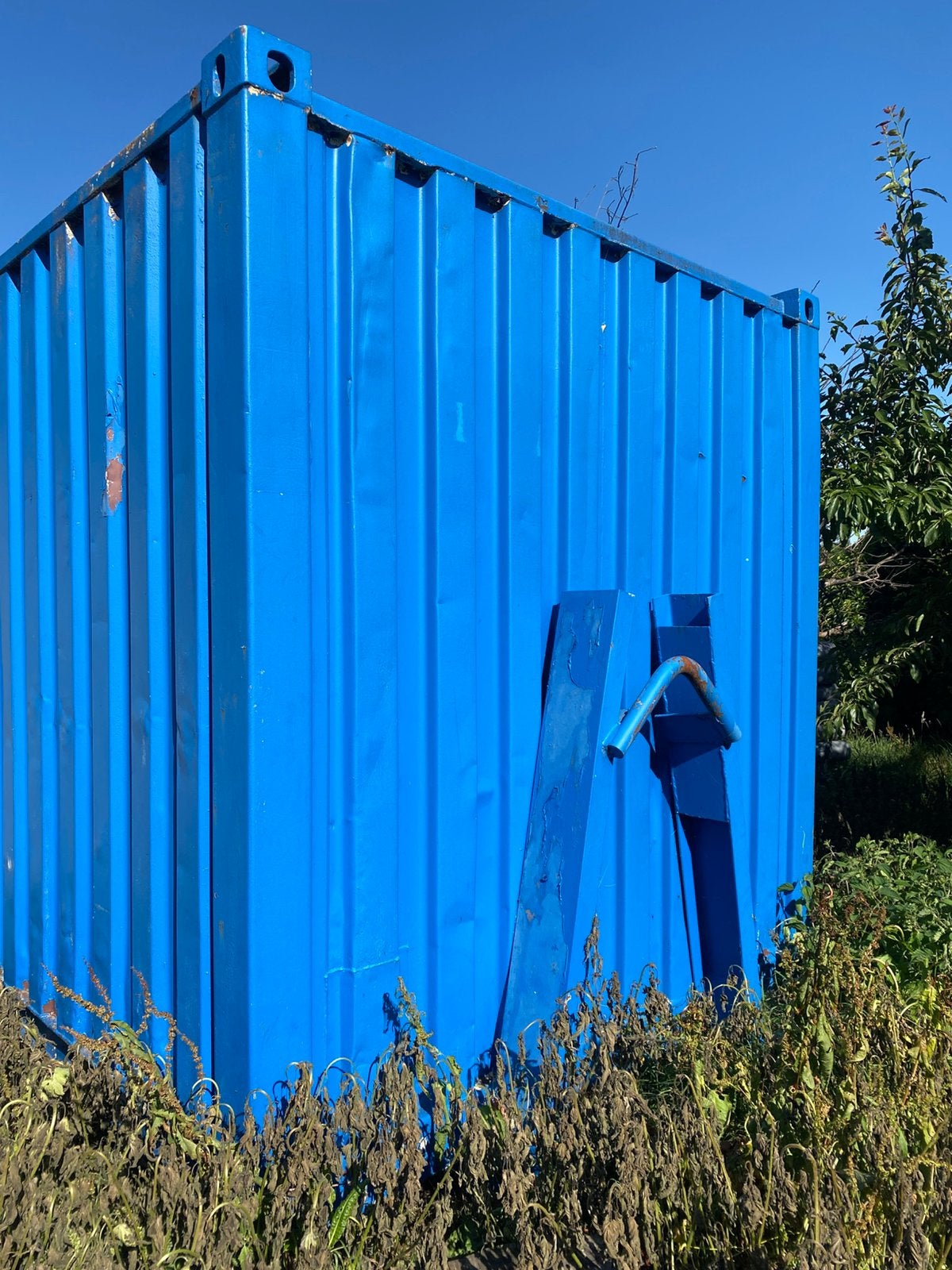 Container op haakarm slede, Enlèvement