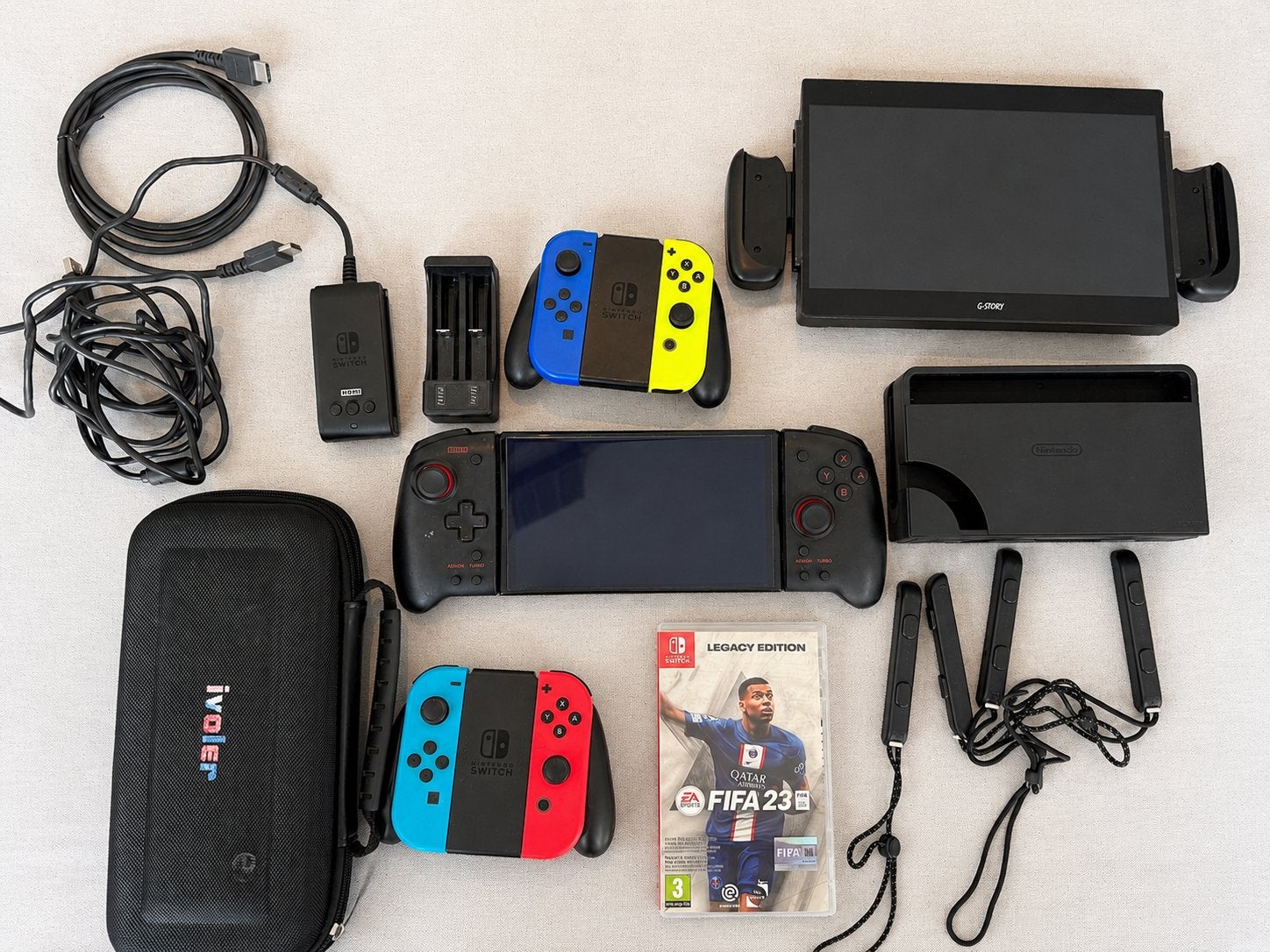 Switch OLED +6 controllers+ G-Story scherm FIFA23 + tas”, Games en Spelcomputers, Zo goed als nieuw, Switch OLED, Ophalen, Met 3 controllers of meer