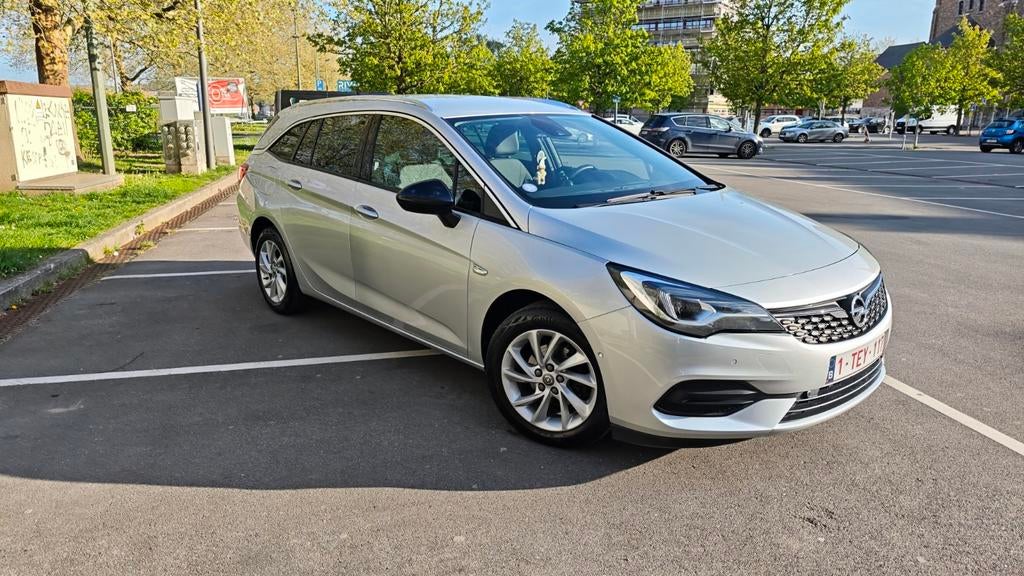 Opel Astra combo 1.2L 35500km, Autos, Argent ou Gris, Achat, Boîte manuelle, Entretenue par le concessionnaire